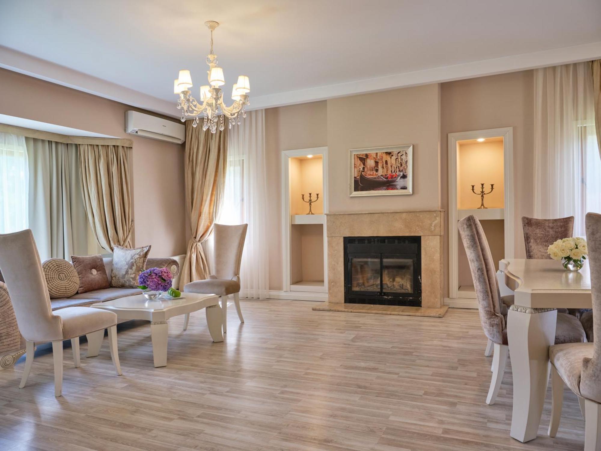 Qafqaz Riverside Hotel Gabala Exterior foto A living room in a modern apartment