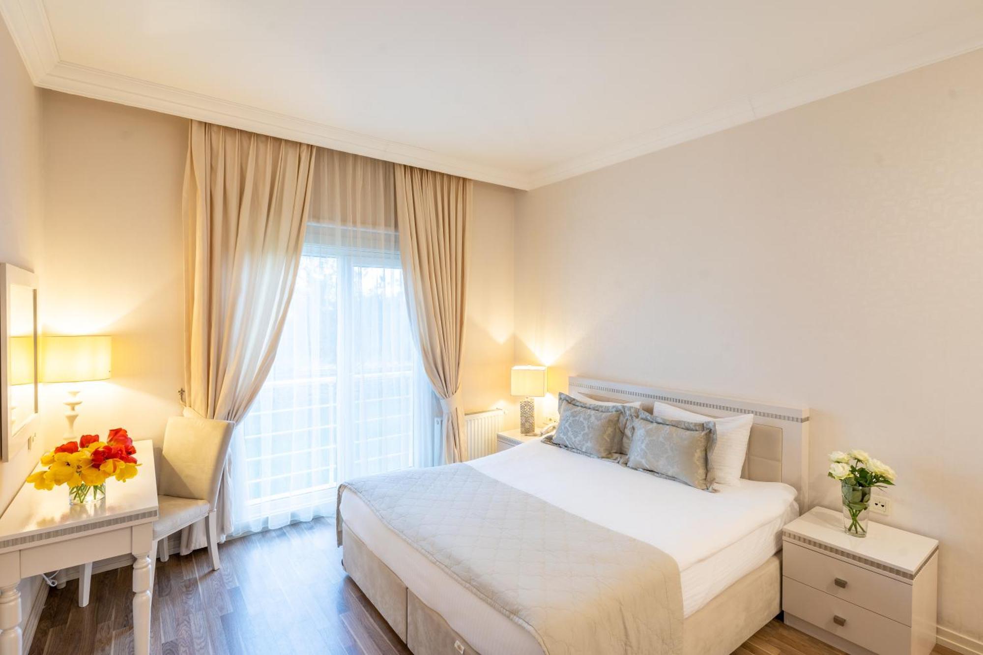 Qafqaz Riverside Hotel Gabala Exterior foto A bedroom at the hotel