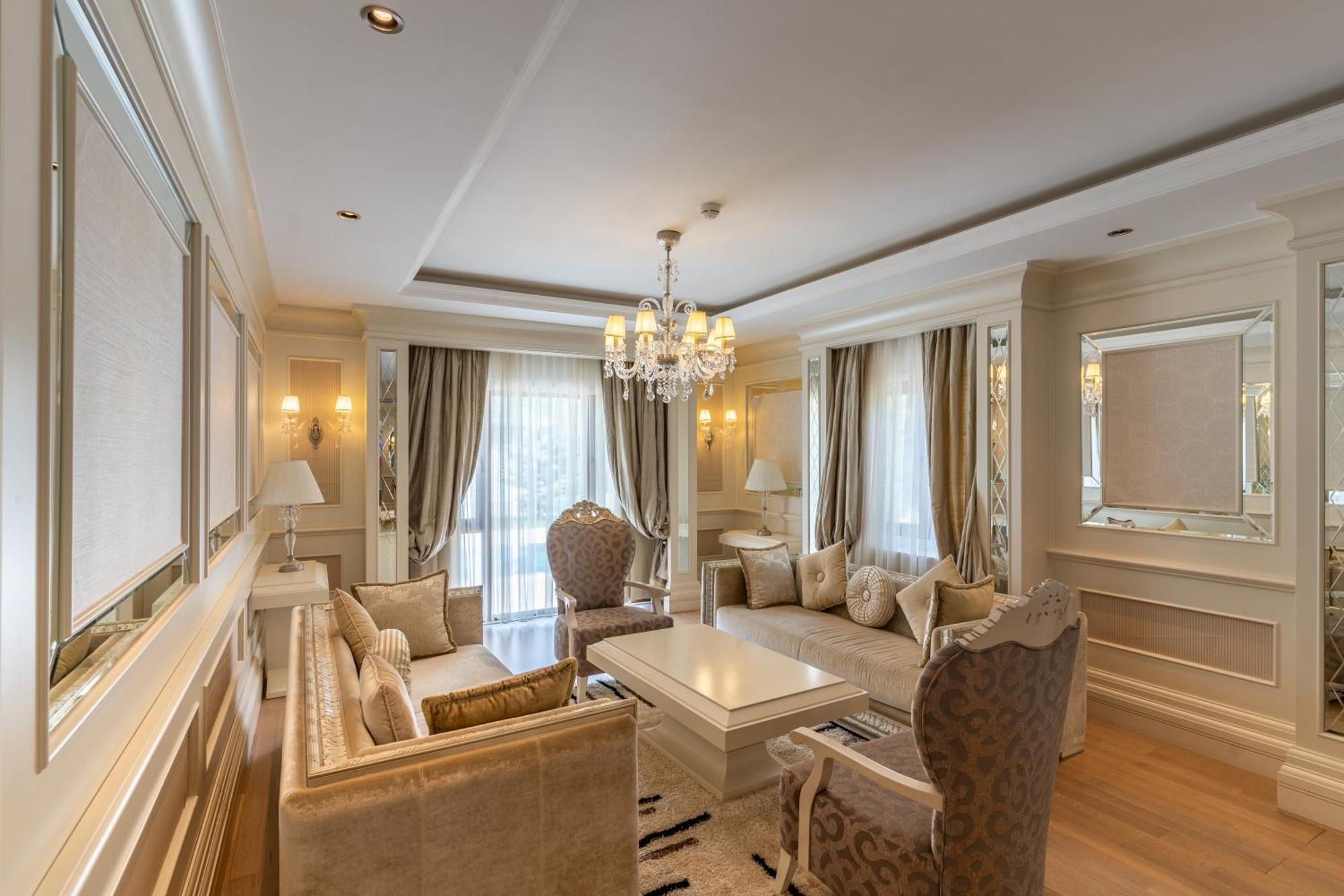 Qafqaz Riverside Hotel Gabala Exterior foto A living room in the hotel