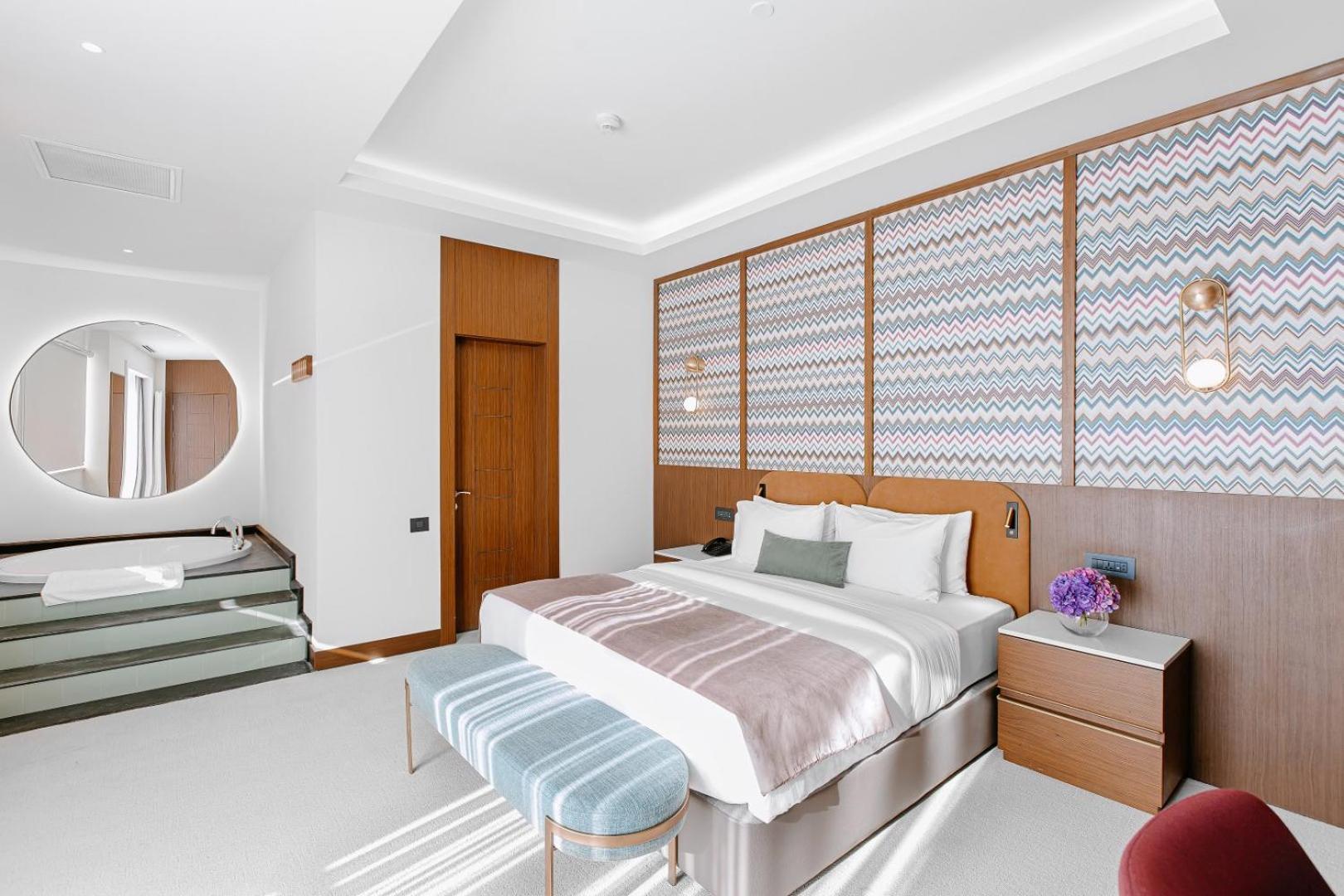 Qafqaz Riverside Hotel Gabala Exterior foto A bedroom at the hotel
